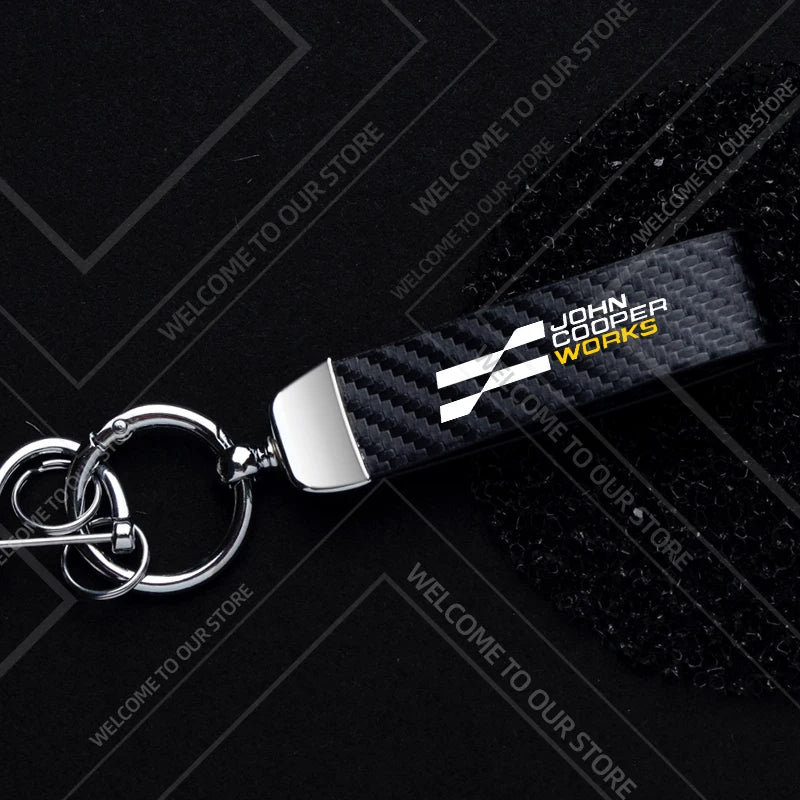 1PCS Car Keychain New JCW Logo For Mini Cooper S F54 F55 F56 F57 R58 R59 Widget Ornaments Metal Carbon Fiber Leather Key Chain