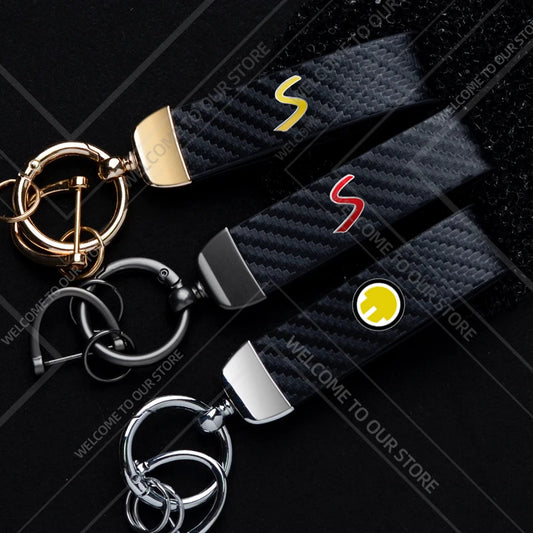1PCS Car Keychain SE Plug S Logo For Mini Cooper S JCW R53 R55 F54 F55 F56 Widget Ornaments Metal Carbon Fiber Leather Key Chain