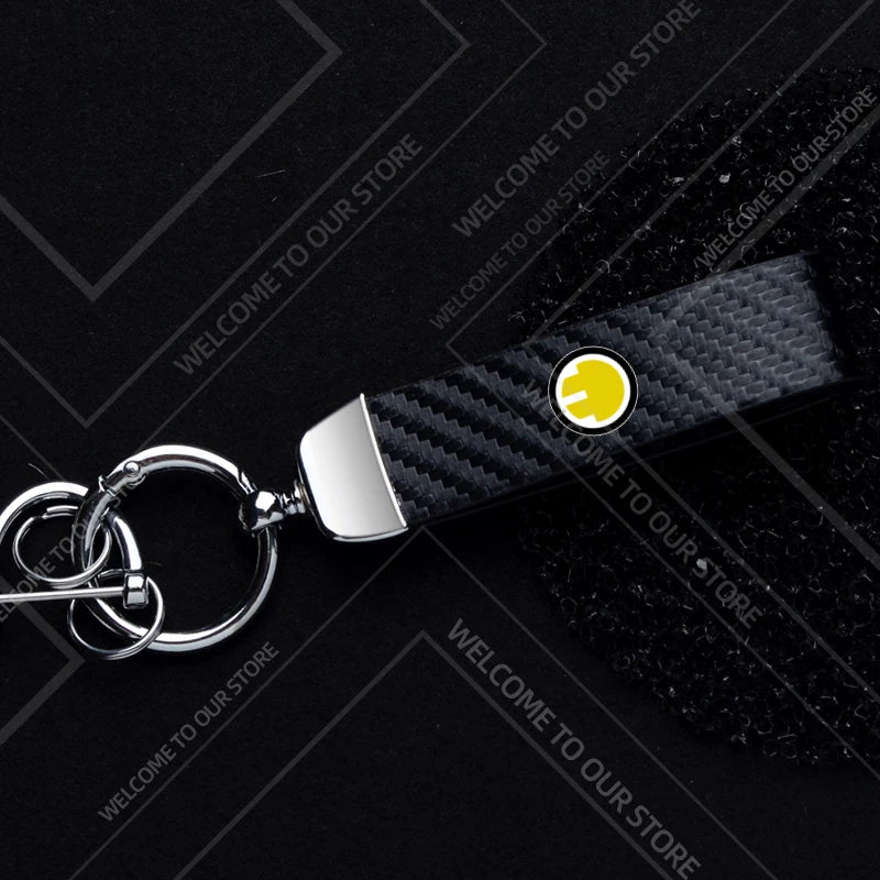 1PCS Car Keychain SE Plug S Logo For Mini Cooper S JCW R53 R55 F54 F55 F56 Widget Ornaments Metal Carbon Fiber Leather Key Chain