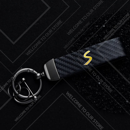 1PCS Car Keychain SE Plug S Logo For Mini Cooper S JCW R53 R55 F54 F55 F56 Widget Ornaments Metal Carbon Fiber Leather Key Chain