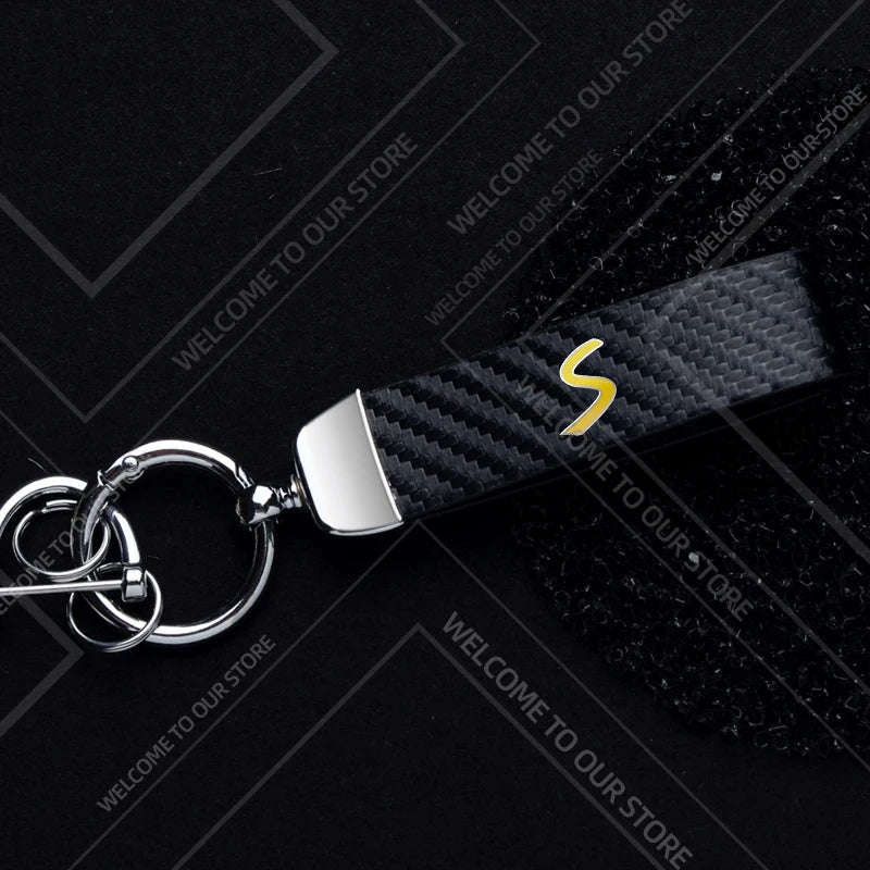 1PCS Car Keychain SE Plug S Logo For Mini Cooper S JCW R53 R55 F54 F55 F56 Widget Ornaments Metal Carbon Fiber Leather Key Chain