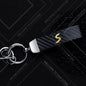 1PCS Car Keychain SE Plug S Logo For Mini Cooper S JCW R53 R55 F54 F55 F56 Widget Ornaments Metal Carbon Fiber Leather Key Chain