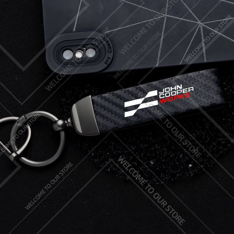 1PCS Car Keychain New JCW Logo For Mini Cooper S F54 F55 F56 F57 R58 R59 Widget Ornaments Metal Carbon Fiber Leather Key Chain